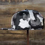 The Wearer's Left on the Los Angeles Raiders NFL OnField Summer Training 2022 Camo 9Fifty Snapback | Black Camo 9Fifty