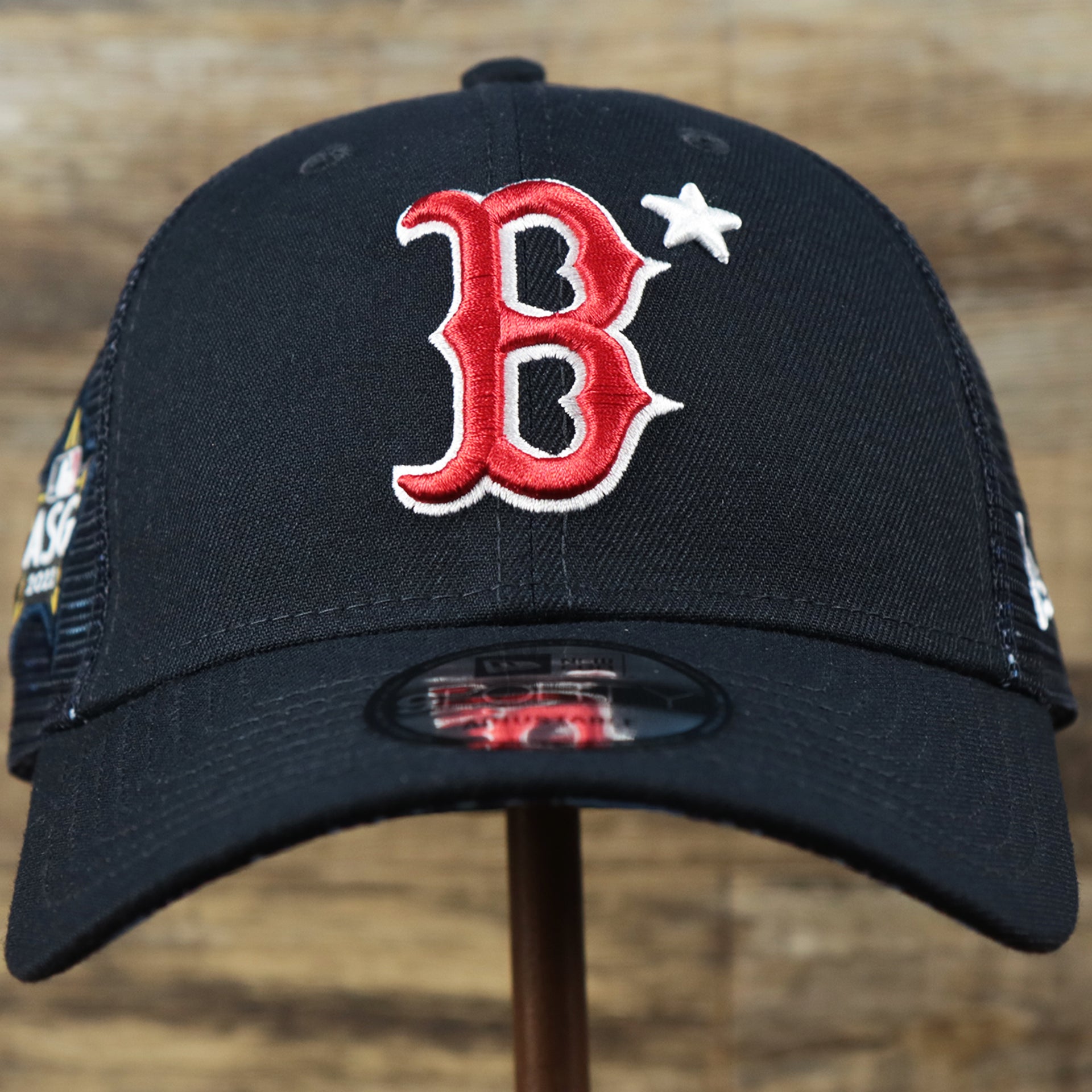 The front of the Boston Red Sox Metallic All Star Game MLB 2022 Side Patch 9Forty Mesh Trucker | ASG 2022 Navy Blue Trucker Hat