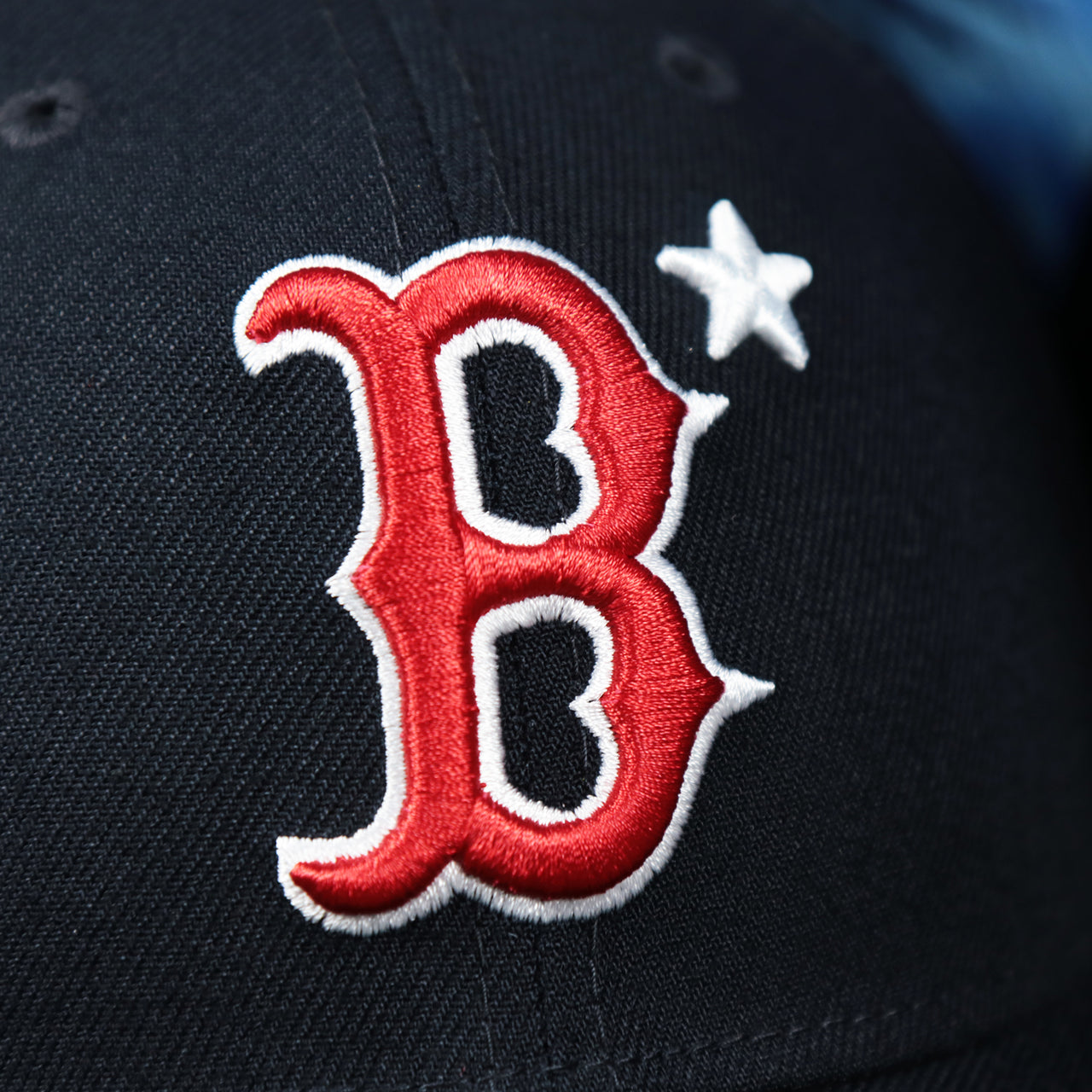 The Boston Red Sox Logo on the Boston Red Sox Metallic All Star Game MLB 2022 Side Patch 9Forty Mesh Trucker | ASG 2022 Navy Blue Trucker Hat