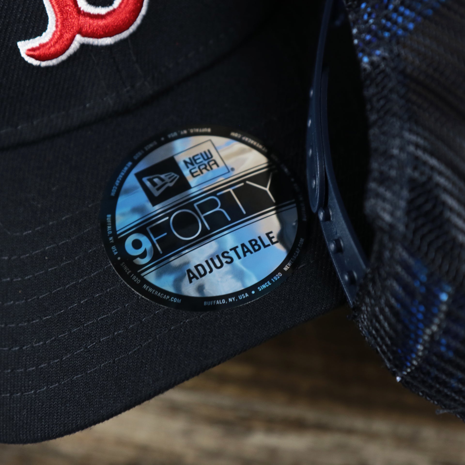 The 9Forty New Era Sticker on the Boston Red Sox Metallic All Star Game MLB 2022 Side Patch 9Forty Mesh Trucker | ASG 2022 Navy Blue Trucker Hat