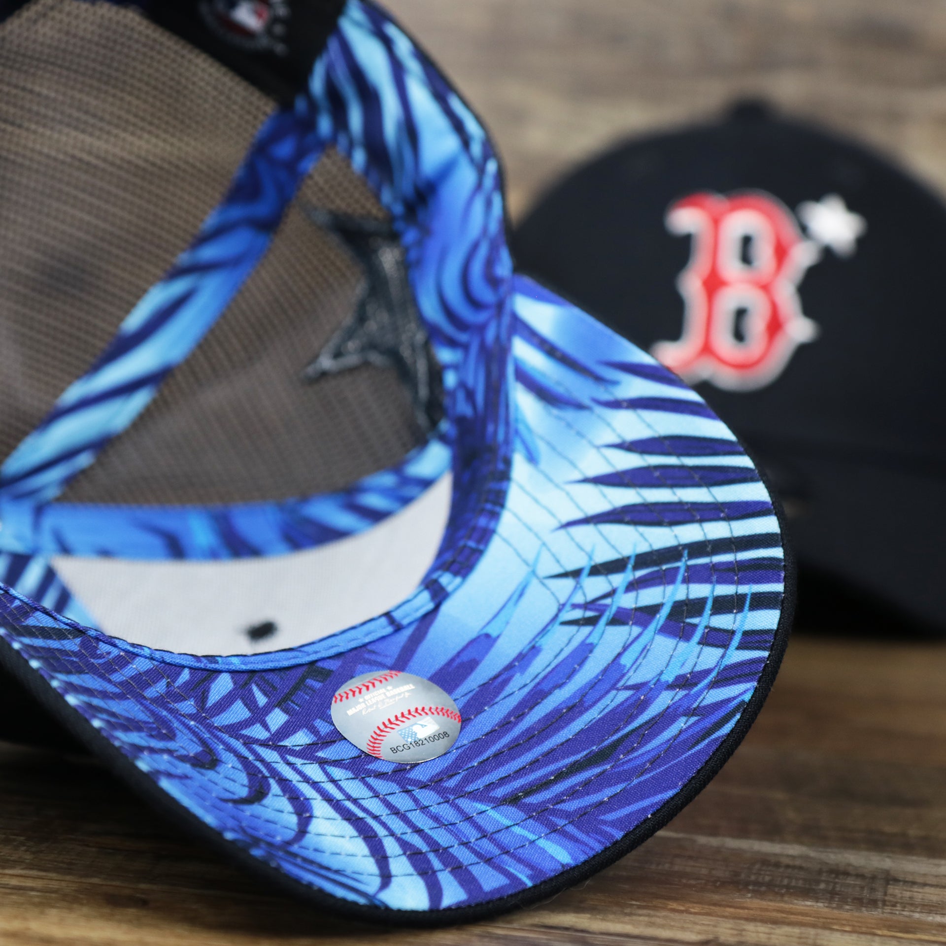 The undervisor on the Boston Red Sox Metallic All Star Game MLB 2022 Side Patch 9Forty Mesh Trucker | ASG 2022 Navy Blue Trucker Hat