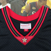 Close up of the Mitchell and Ness label on the Allen Iverson 2000-2001 Philadelphia 76ers NBA Playoffs Throwback SwingMan Jersey | Black, Mitchell and Ness