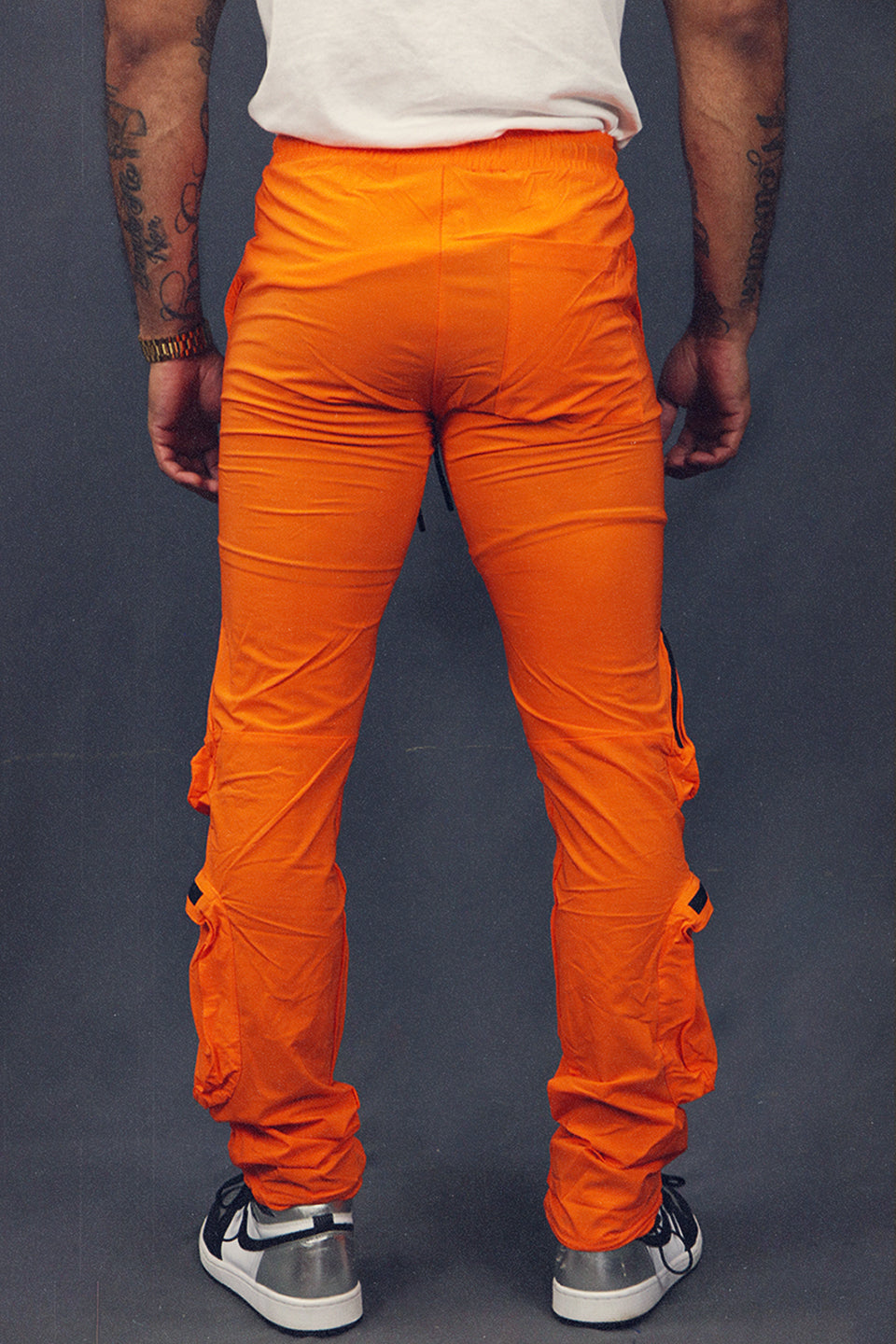Men's Tactical Nylon Track Pants Street Sweatpants Utility Joggers with Zipper Pockets | Orange back view