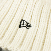 The New Era Logo on the Women’s Philadelphia Steelers 2022 AFC Cuffed Winter Knit Meeko Pom Pom Beanie | Women’s White Winter Beanies