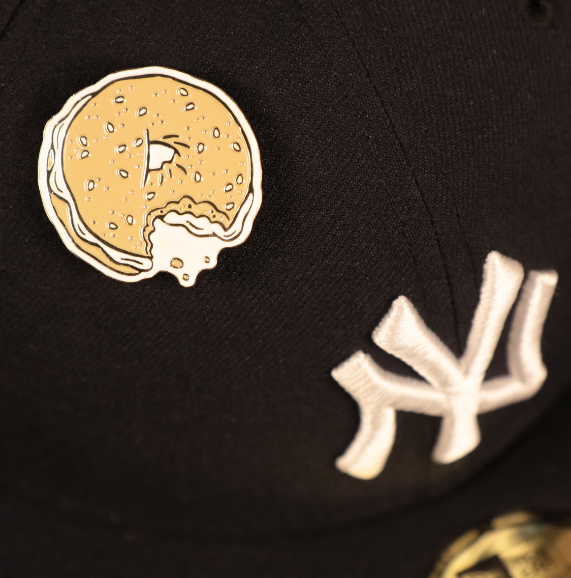 The New York Bagel Fitted Cap Pin | Enamel Pin For Hat through the air holes