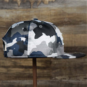 The Wearer's Right on the Seattle Seahawks NFL OnField Summer Training 2022 Camo 9Fifty Snapback | Navy Blue Camo 9Fifty
