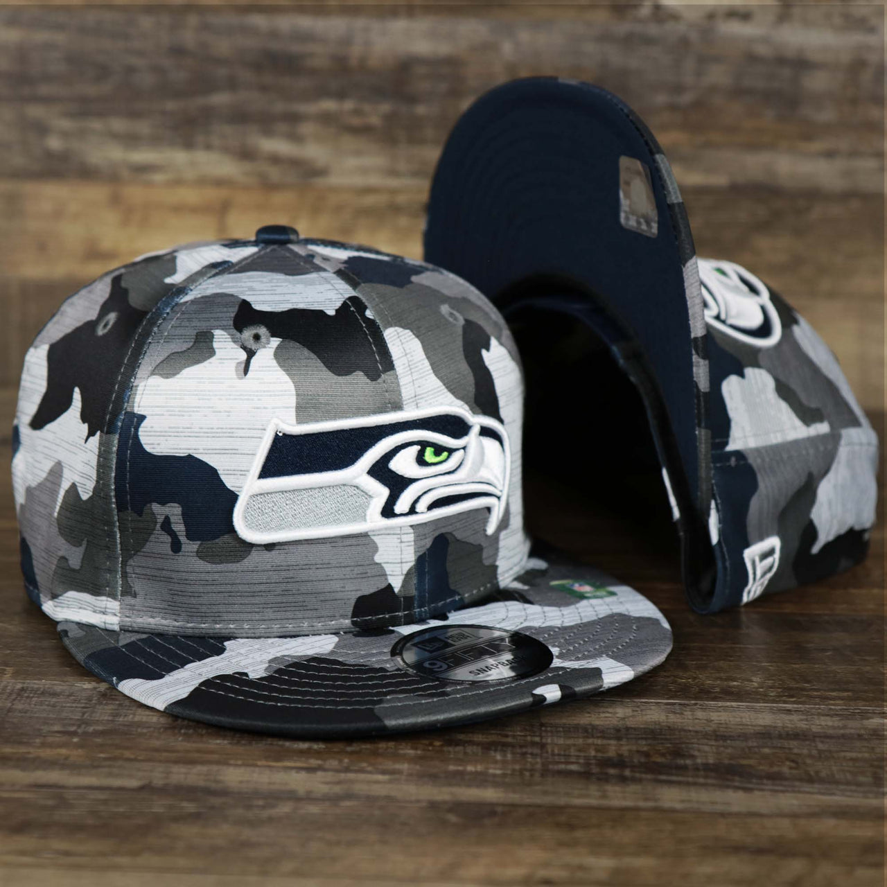 The Seattle Seahawks NFL OnField Summer Training 2022 Camo 9Fifty Snapback | Navy Blue Camo 9Fifty