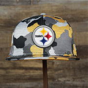 The front of the Pittsburgh Steelers NFL OnField Summer Training 2022 Camo 9Fifty Snapback | Yellow Camo 9Fifty