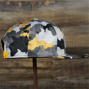 The Wearer's Right on the Pittsburgh Steelers NFL OnField Summer Training 2022 Camo 9Fifty Snapback | Yellow Camo 9Fifty