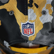 The NFL Logo Patch on the back of the Pittsburgh Steelers NFL OnField Summer Training 2022 Camo 9Fifty Snapback | Yellow Camo 9Fifty