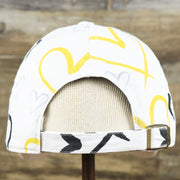 The backside of the Kids Pittsburgh Steelers Hearts All Over Print Dad Hat | White Kid’s Dad Hat
