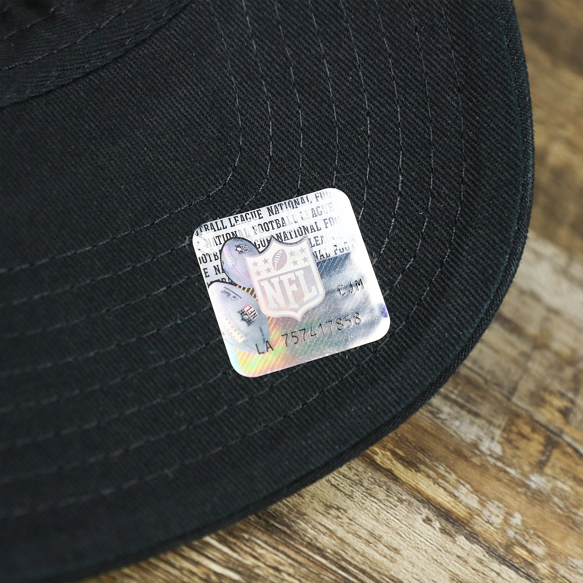 The NFL Sticker on the Throwback Pittsburgh Steelers Legacy Logo Highpoint Mesh Back Dad Hat | Mesh Back Black Dad Hat