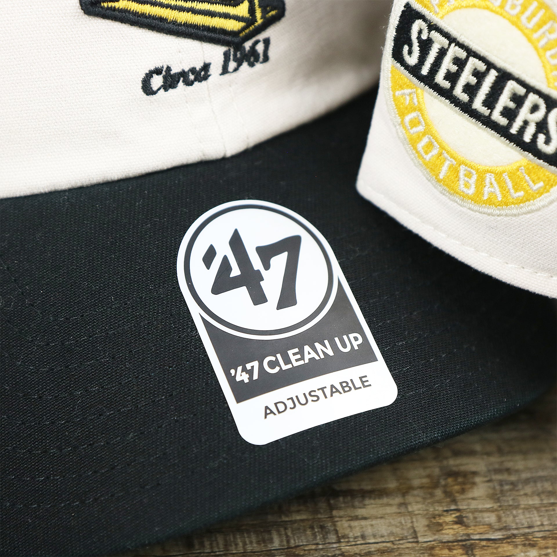 The 47 Brand Sticker on the Throwback Pittsburgh Steelers Embroidered 1987 Steelers Logo NFL Steelers Side Patch Dad Hat | Bone Dad Hat