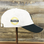 The wearer's right on the Throwback Pittsburgh Steelers Embroidered 1987 Steelers Logo NFL Steelers Side Patch Dad Hat | Bone Dad Hat