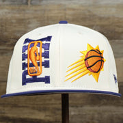 The front of the Phoenix Suns NBA 2022 Draft Gray Bottom 9Fifty Snapback | New Era Cream/Purple