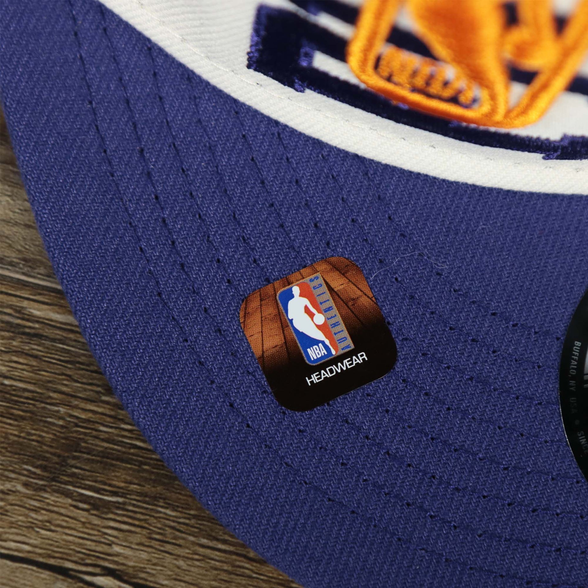 The NBA Offical Headwear Sticker on the Phoenix Suns NBA 2022 Draft Gray Bottom 9Fifty Snapback | New Era Cream/Purple