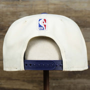 The backside of the Phoenix Suns NBA 2022 Draft Gray Bottom 9Fifty Snapback | New Era Cream/Purple