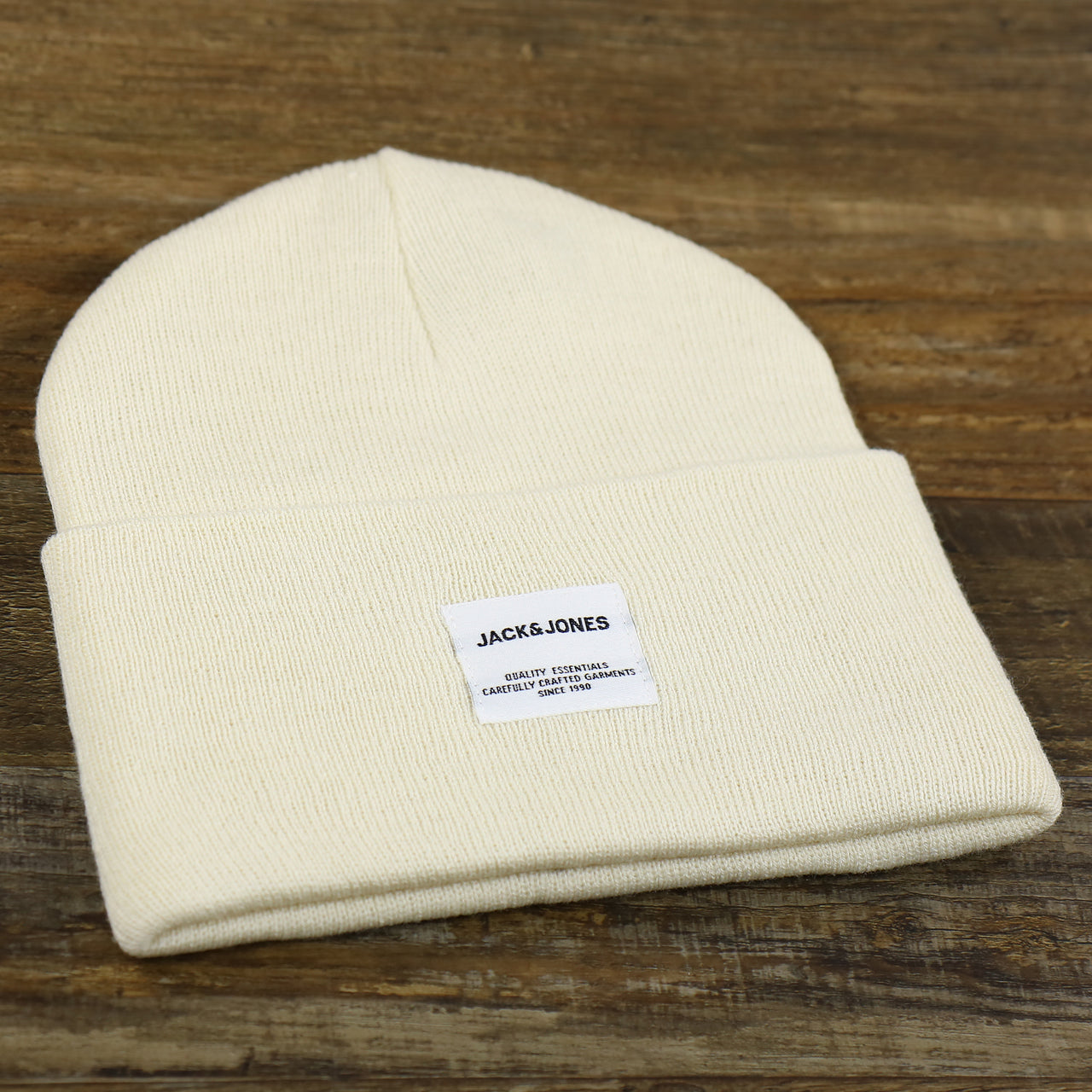 The front of the Jack And Jones Turtle Dove High Cuff Knit Beanie | White Knit Beanie