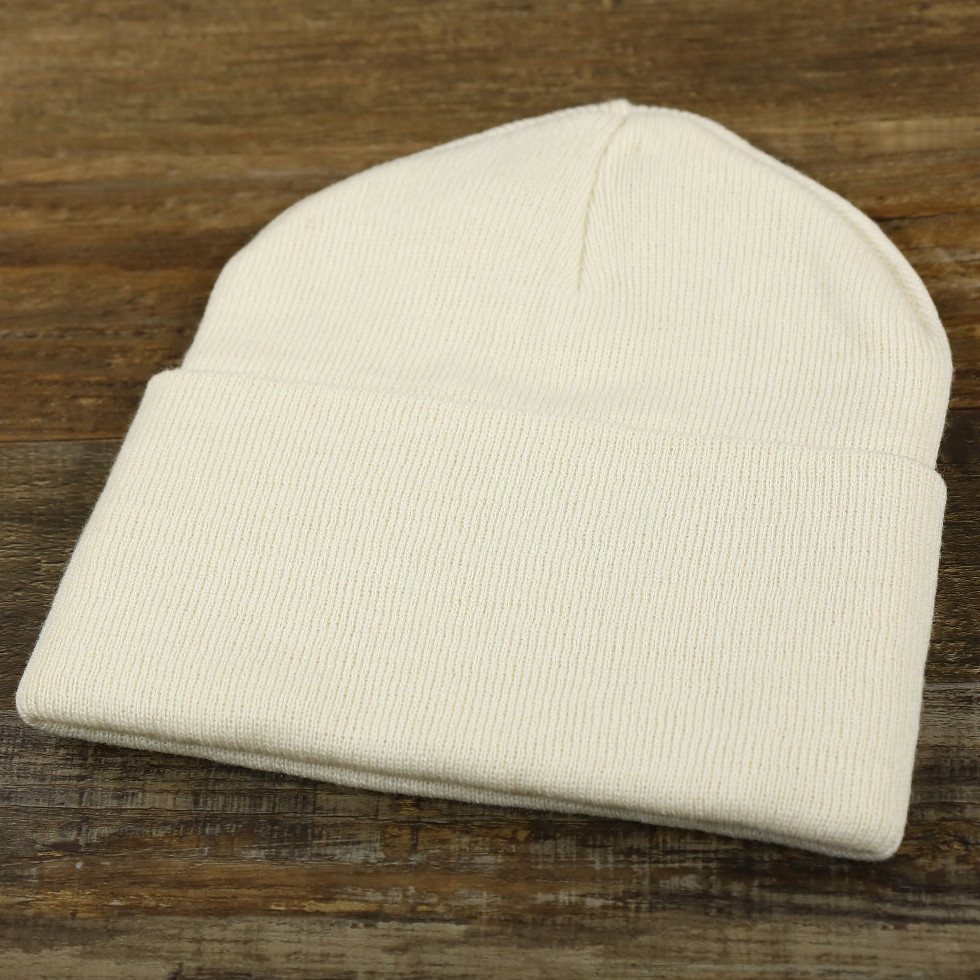 The backside of the Jack And Jones Turtle Dove High Cuff Knit Beanie | White Knit Beanie