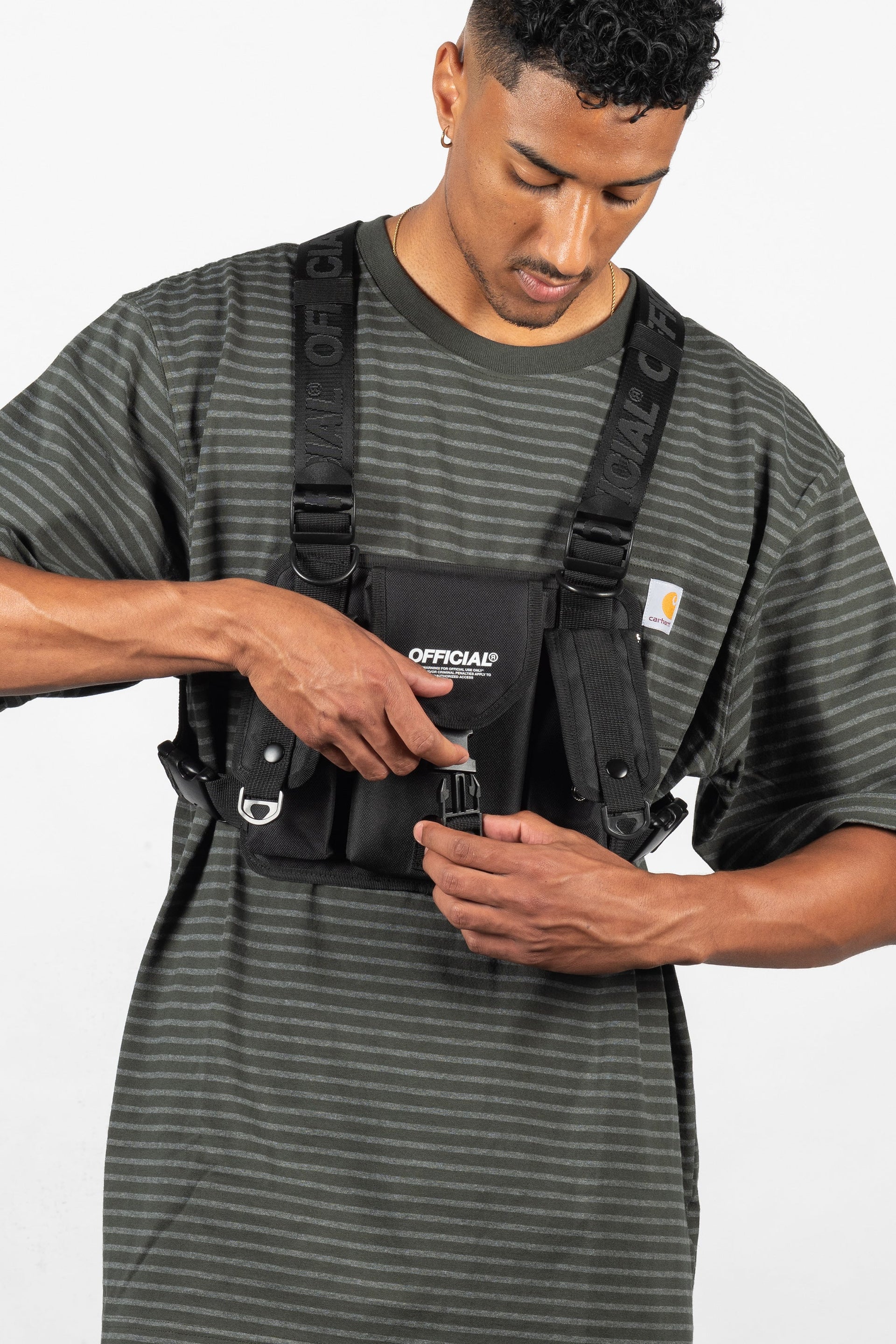 The clasp on theStreetwear Tactics Chest Bag Utility Vest | Official Black