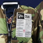 The Sports Unite Us Graphic on the Detroit Tigers MLB Patch Alpha Industries Reversible Bomber Jacket With Camo Liner | Navy Blue Bomber Jacket