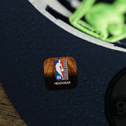 The NBA Offical Headwear Sticker on the Minnesota Timberwolves NBA 2022 Draft Gray Bottom 9Fifty Snapback | New Era Cream/Navy Blue