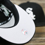 The undervisor on the Chicago White Sox Southside Side Patch Gray Bottom 59Fifty Fitted Cap | Black 59Fifty Cap