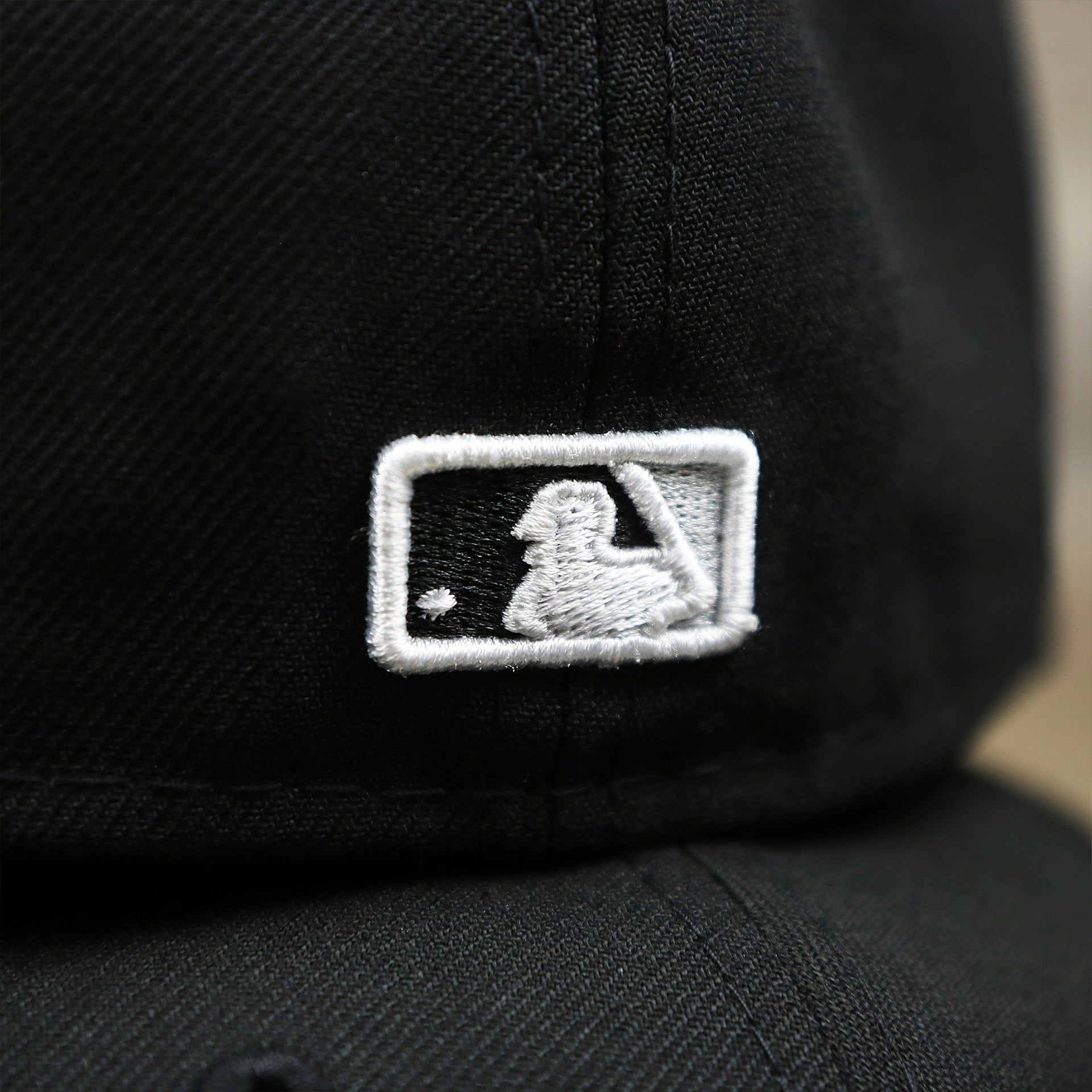 The MLB Batterman Logo on the Chicago White Sox Southside Side Patch Gray Bottom 59Fifty Fitted Cap | Black 59Fifty Cap