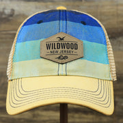 The front of the Wildwood New Jersey Leather Patch Shoreline Gradient Design Vintage Trucker Hat | Washed Gradient Trucker Hat