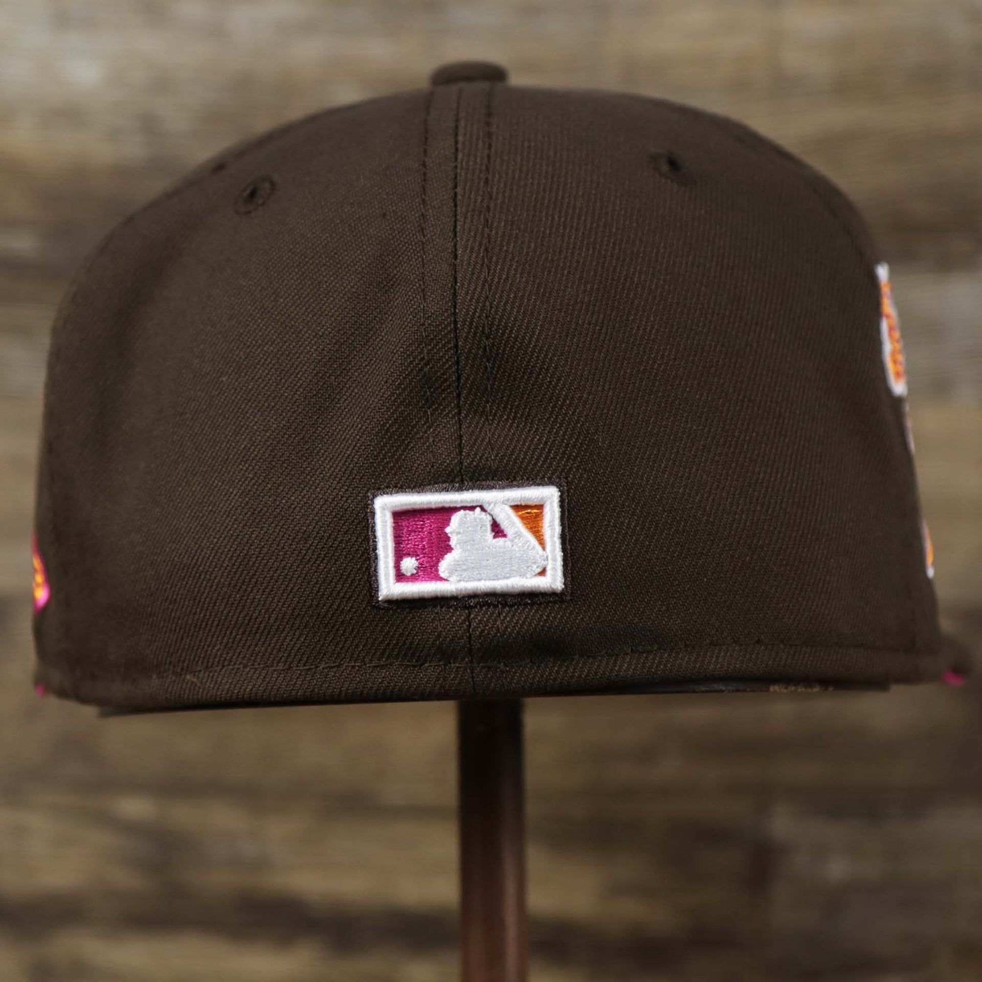The backside of the Cooperstown Philadelphia Phillies Coffee Shop 1952 All Star Game Liberty Bell Side Patch 59Fifty Fitted Cap | Donut Pack Walnut 59Fifty