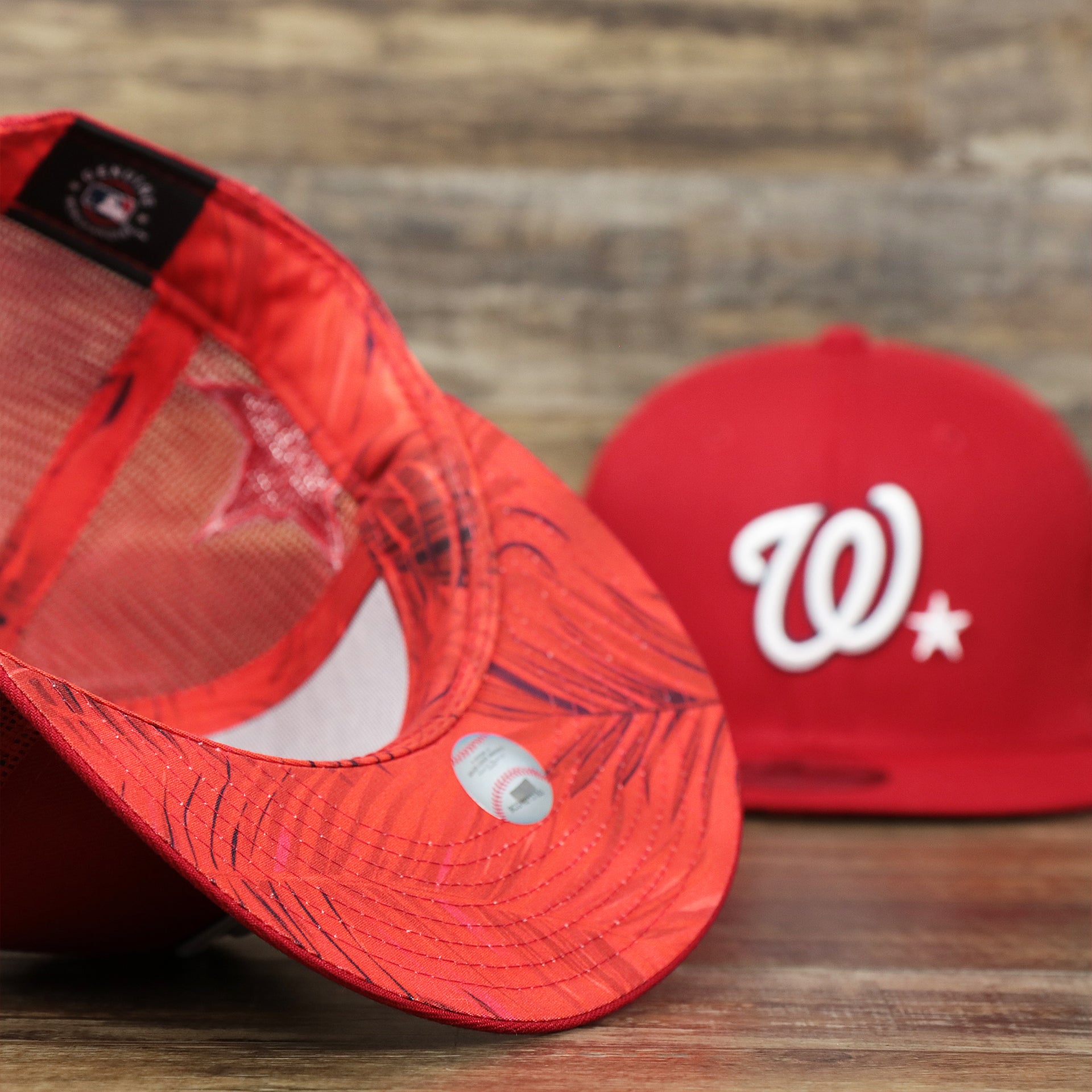 The undervisor on the Washington Nationals Metallic All Star Game MLB 2022 Side Patch 9Fifty Mesh Snapback | ASG 2022 Red Trucker Hat