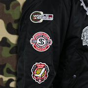 The Chicago World Series Wins Side Patches on the Chicago White Sox MLB Patch Alpha Industries Reversible Bomber Jacket With Camo Liner | Black Bomber Jacket