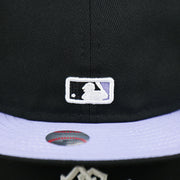 The MLB Batterman Logo on the Chicago White Sox Pop Sweat Pastel World Series Side Patch Fitted Cap With Purple Undervisor | Black 59Fifty Cap