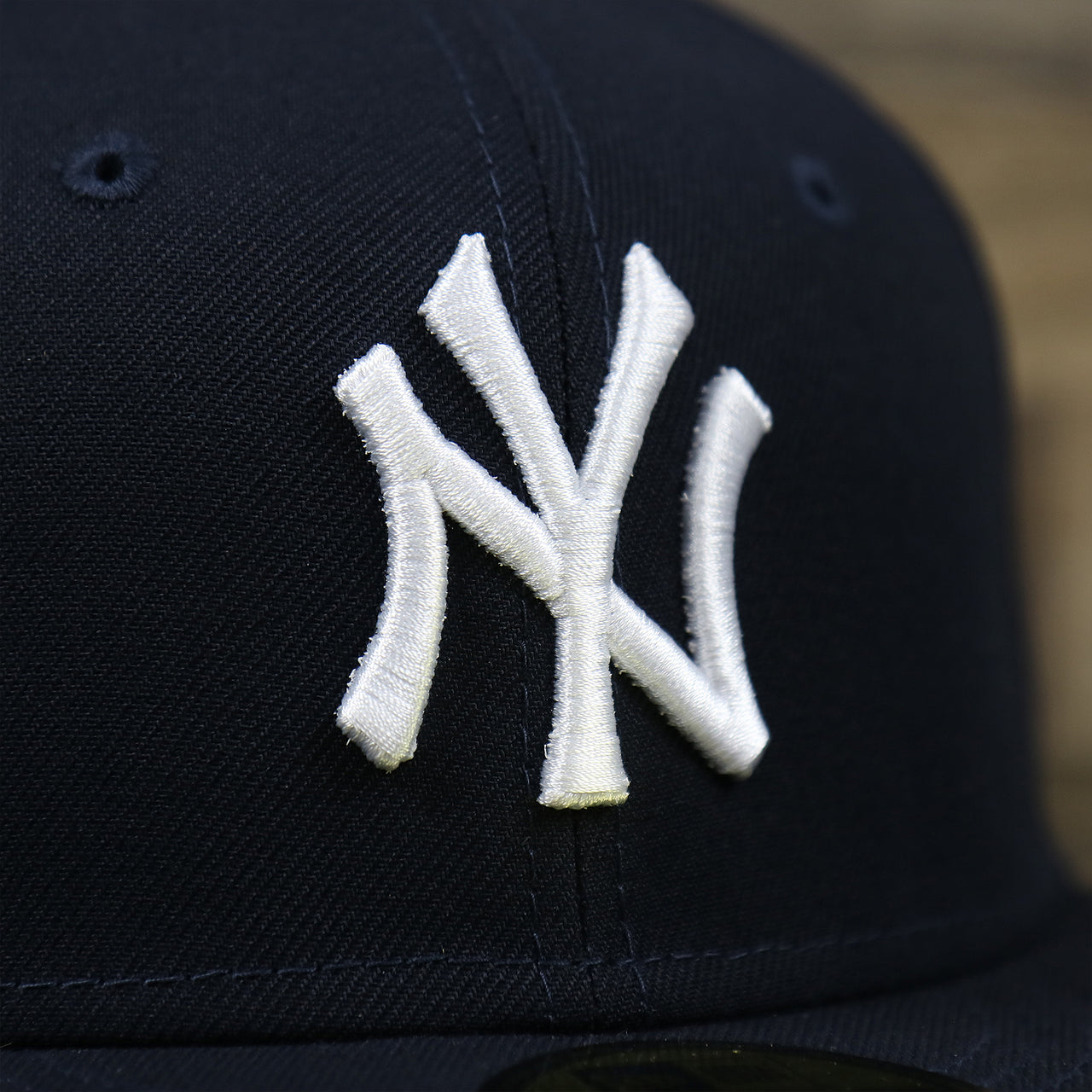 The Yankees Logo on the New York Yankees Lady Liberty Side Patch Gray Bottom 59Fifty Fitted Cap | Navy Blue 59Fifty Cap