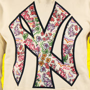 The Yankees Floral Logo on the New York Yankees Floral MLB Pullover Hoodies | Cream Pullover Hoodie