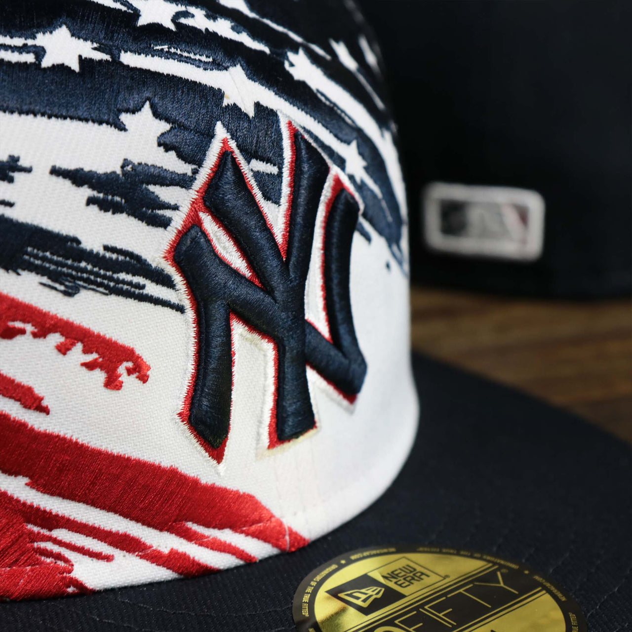 The logo on the Stars And Stripes New York Yankees 4th of July 9Fifty | New Era Navy OSFM