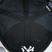The inside of the Infant New York Yankees Gray Bottom Dad Hat | Navy Infant Dad Hat