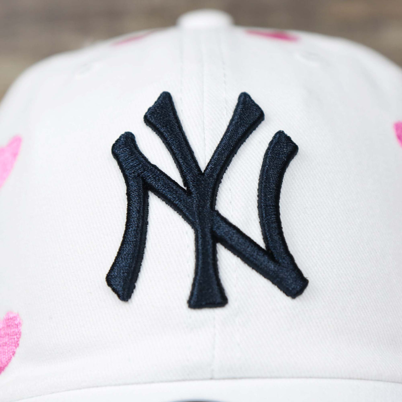The Yankees Logo on the Kid’s New York Yankees Hearts All Over Dad Hat | White Youth Dad Hat