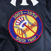 The Yankees 50 Year Anniversary Side Patch on the New York Yankees MLB Patch Alpha Industries Reversible Bomber Jacket With Camo Liner | Navy Blue Bomber Jacket