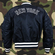 The backside of the New York Yankees MLB Patch Alpha Industries Reversible Bomber Jacket With Camo Liner | Navy Blue Bomber Jacket
