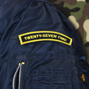 The Twenty-Seven Time Champions Side Patch on the New York Yankees MLB Patch Alpha Industries Reversible Bomber Jacket With Camo Liner | Navy Blue Bomber Jacket