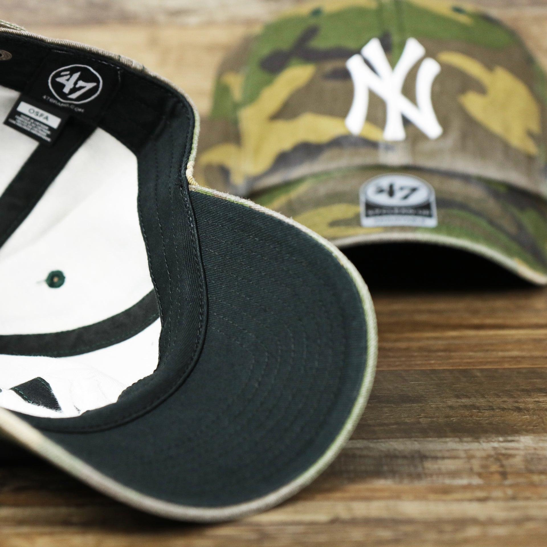 The undervisor on the New York Yankees Camouflage Dad Hat with White Logo | Camo Dad Hat