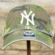 The front of the New York Yankees Camouflage Dad Hat with White Logo | Camo Dad Hat