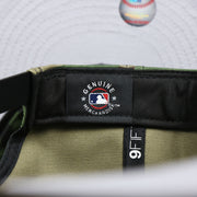 The MLB Merchandise Tag on the New York Yankees Gray Bottom Camo 9Fifty Snapback | Camo 9Fifty Cap