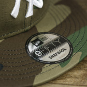 The 9Fiftys Sticker on the New York Yankees Gray Bottom Camo 9Fifty Snapback | Camo 9Fifty Cap