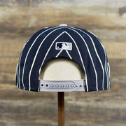 The backside of the New York Yankees City Arch Striped 9Fifty Snapback Cap | Pin Stripe 9Fifty Cap