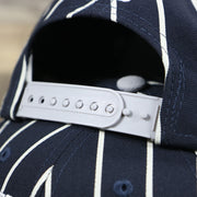 The Gray Adjustable Strap on the New York Yankees City Arch Striped 9Fifty Snapback Cap | Pin Stripe 9Fifty Cap