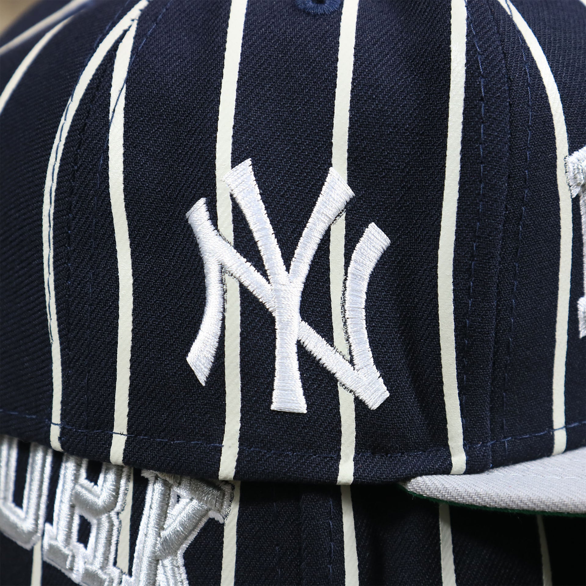 The Yankees Patch on the New York Yankees City Arch Striped 9Fifty Snapback Cap | Pin Stripe 9Fifty Cap