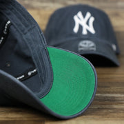 The Undervisor on the Cooperstown New York Yankees Green Bottom Yankees Wordmark Fitted Cap | Vintage Navy Fitted Cap