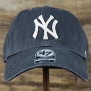 The front of the Cooperstown New York Yankees Green Bottom Yankees Wordmark Fitted Cap | Vintage Navy Fitted Cap